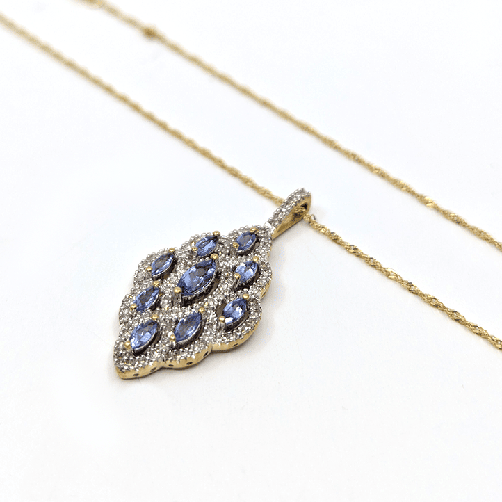 A 10k yellow gold necklace with a 0.75ctw natural diamond pendant design. Length: 18"